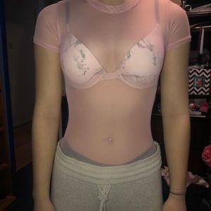 Pink mesh body suit